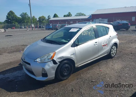 2014 Toyota Prius C One z USA, uszkodzony, nr VIN JTDKDTB31E1068251